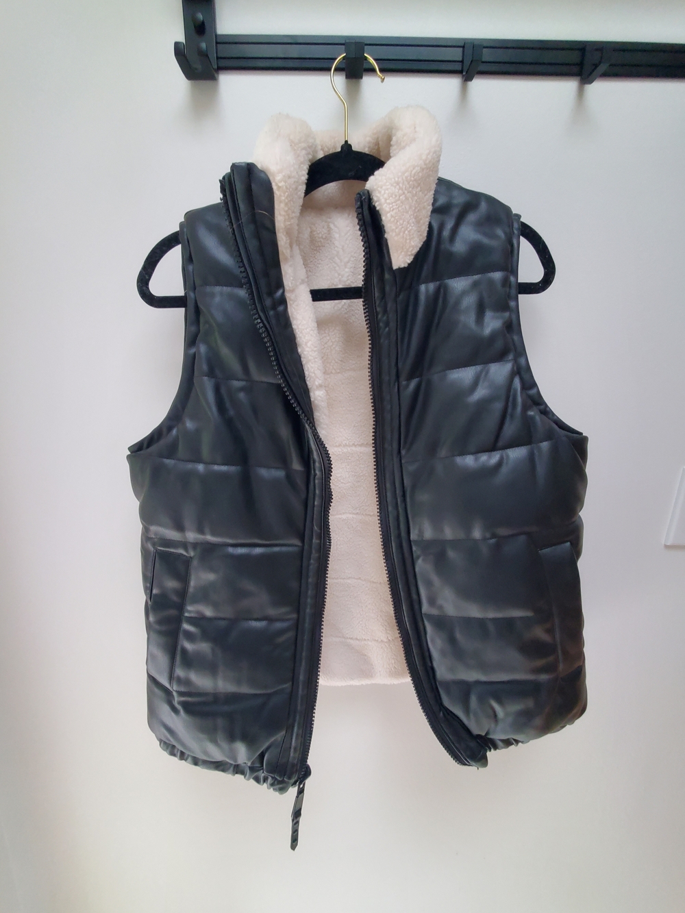 Rebecca Minkoff's Black Reversible Puffer Vest with Cream Sherpa Lining